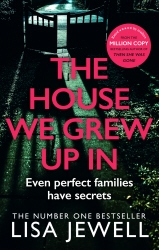 Book cover of The House We Grew Up In by Lisa Jewell