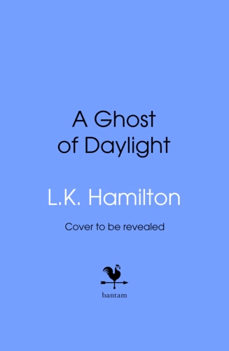 Book cover of A Ghost of Daylight by Laurell K Hamilton