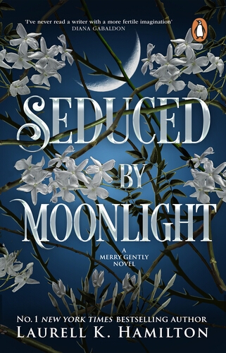 Book cover of A Stroke Of Midnight by Laurell K Hamilton