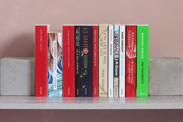 Previous Booker Prize-winning books lined up on a shelf