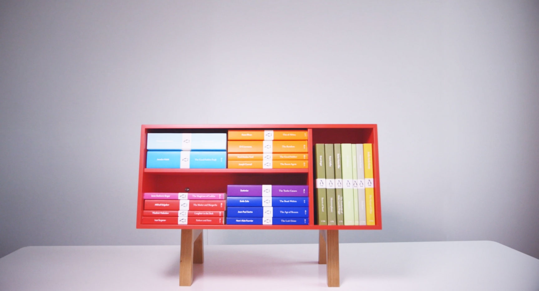 Red Penguin Isokon Donkey bookshelf for Pocket Penguins