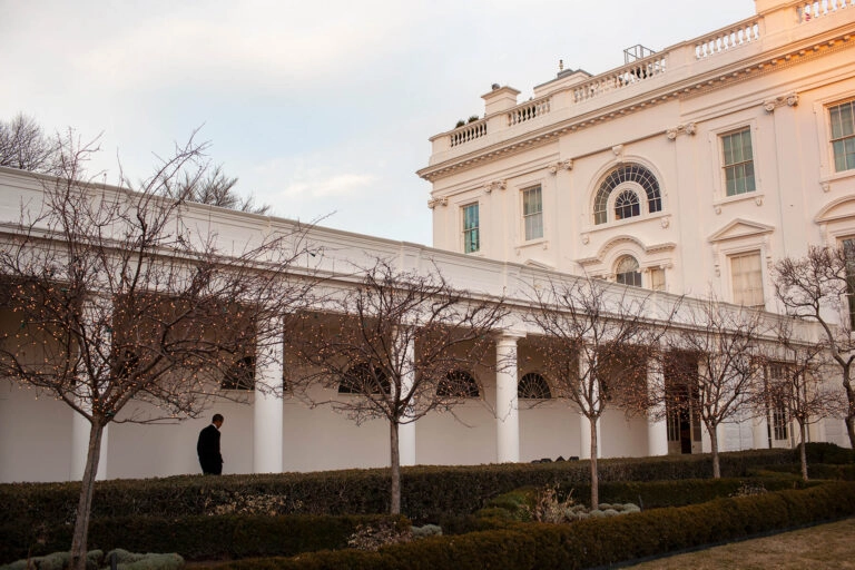 President Barack Obama walks along the West Colonnade of the White House, January 8, 2011. 