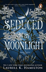 Book cover of Seduced By Moonlight by Laurell K Hamilton