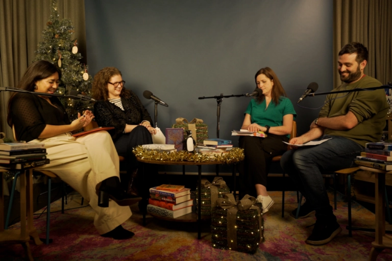 Photo of the Penguin Podcast team recording in the studio
