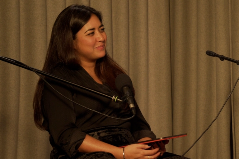 Photo of the Penguin Podcast host Rhianna Dhillon recording in the studio