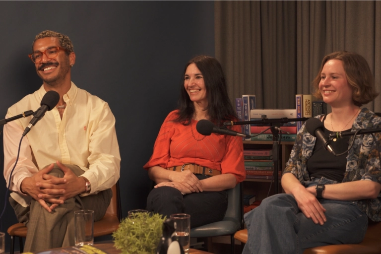 Debut authors (left to right) William Rayfet Hunter, Fiza Saeed McLynn and Catherine Airey sitting and talking in the book-filled Penguin Podcast studio