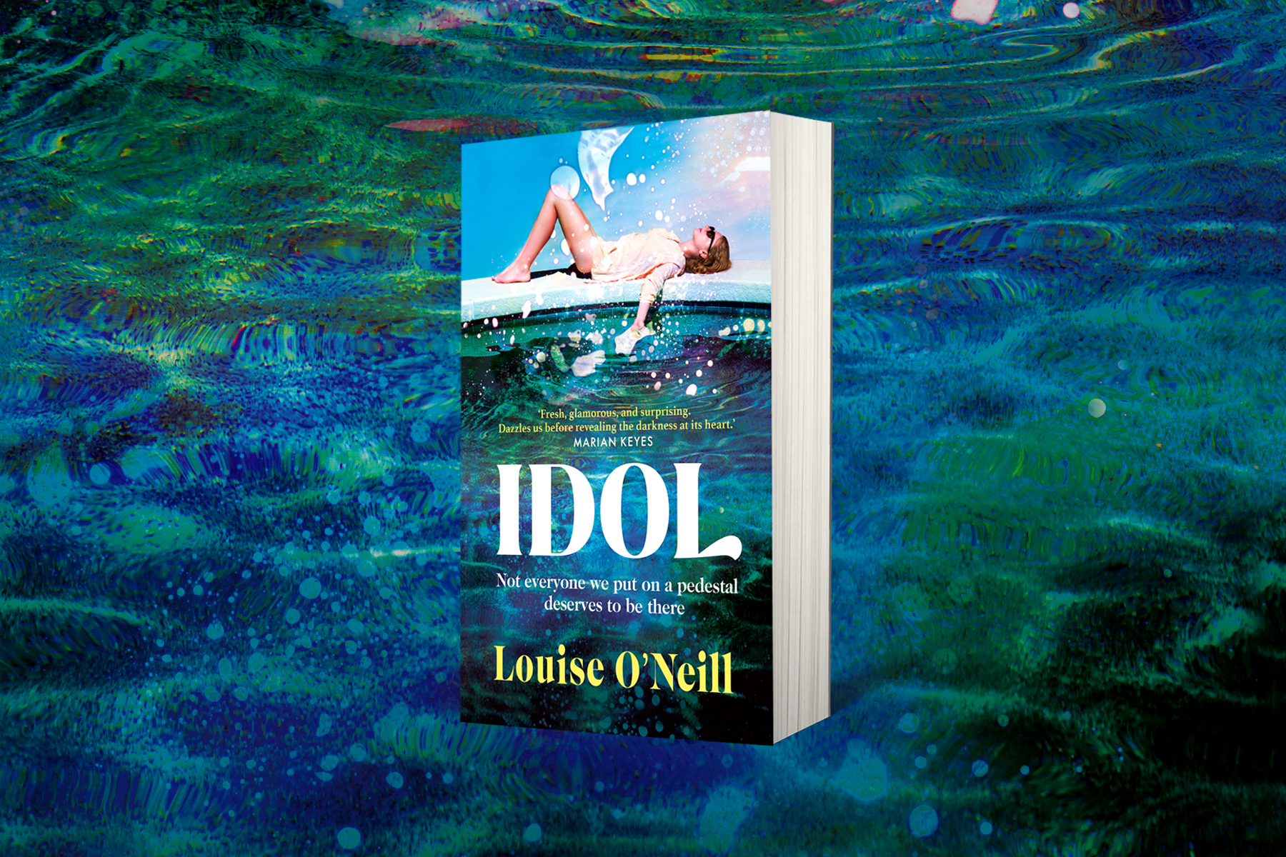 The novel Idol by Louise O'Neill, shot against a blue-green aquatic background