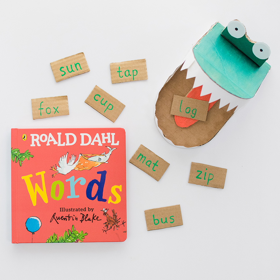 A photo of the DIY Enormous Crocodile word game alongside the book Roald Dahl: Words