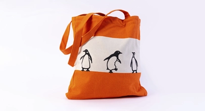 Photo of the Penguin 90th tote bag as featured on the Penguin Shop